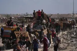 Israel declares Gaza’s largest city a combat zone as the bodies of 2 hostages are recovered