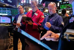 Wall Street points toward gains before the opening bell and another busy week of corporate earnings