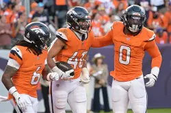 Broncos ILB Justin Strnad continues breakout with game-flipping pick vs. Giants: ‘He’s going crazy’